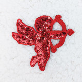 Red Cupid Hat/Pocket Sequin Patch, embroidered patch featuring a cupid with a bow and arrow, decorated with red sequins for a shiny, decorative effect.