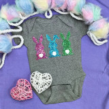 Sequin Bunny Pocket Sized Patch BUNDLE, set of three colorful bunny patches with pink, blue, and green sequins on a gray baby onesie.