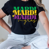 Mardi Gras Stacked DTF Heat Transfer, colorful layered design of Mardi Gras text with a fleur-de-lis symbol on a black t-shirt.