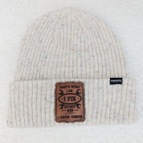 That's What I Do Leather Hat Patch, Beanie hat with a leather patch that says 'That's What I Do, I Fix Stuff and I Know Things' on the front.