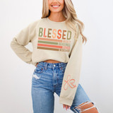 Blessed SET Screen Print Heat Transfer, a beige sweatshirt with a colorful religious-themed design and text.