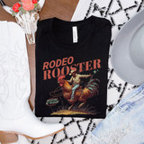 Rodeo Rooster DTF Heat Transfer, a colorful design featuring a cowboy riding a rooster on a black T-shirt.