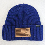 Gun American Flag Leather Hat Patch, blue knit beanie with a leather patch featuring an American flag and guns graphic
