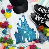 Blue Castle Sequin Patch, glittery blue castle embroidered patch on white fabric.