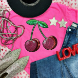 Cherries Sequin Patch, vibrant pink fabric with green leaves and red cherry design made of sequins.