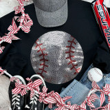 Spangled BASEBALL Transfer, a black t-shirt with a sparkling baseball design featuring red stitches, surrounded by baseball-themed accessories including a baseball with a red and white ribbon, striped shoelaces, a cap, jeans, and a baseball bat.
