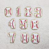 Baseball Chenille Numbers with Gold Glitter, set of decorative fabric numbers 0-9 with red baseball stitching and gold glitter edges.