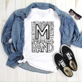 Marching Band typography Sublimation Transfer, displayed on a white t-shirt with a large stylized 'M' and 'B' surrounded by the words 'Marching' and 'Band' in different fonts and sizes.