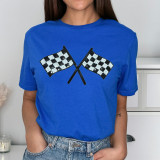 Checkered Flag Sequin Patch, close-up of a patch featuring two crossed checkered flags embellished with sequins sewn onto a blue T-shirt.