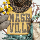 Spangled NASHVILLE Transfer, yellow T-shirt with Nashville lettering, leopard print hat, cowboy boots, yellow pom-pom flowers, denim and patterned accessories for cowgirl style.