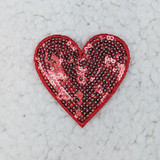 RED sequin heart HAT/POCKET Patch, decorative patch with shiny red sequins in a heart shape on a white background.