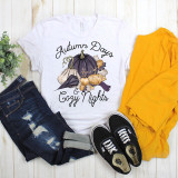 Autumn Days Cozy Nights Fall Pumpkin Sublimation Transfer, a white T-shirt featuring a pumpkin and fall leaves design with the text 'Autumn Days & Cozy Nights'
