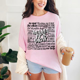 Mama It's Okay Text DTF Heat Transfer, close-up of a woman wearing a pink t-shirt with motivational quotes and designs, holding a coffee cup.