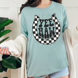 YeeHaw Checkered DTF Heat Transfer, a graphic design featuring the words 'YeeHaw' in bold black letters within a horseshoe shape with black and white checkered pattern.