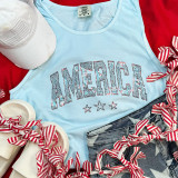 Spangled AMERICA Transfer, American flag-themed rhinestone design on light blue sleeveless top with red, white, and blue accessories.