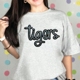 Tigers Sequin Patch, colorful embroidered tiger sequined patch on a gray sweatshirt.