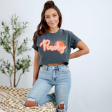 Just Peachy Distressed DTF Heat Transfer, a woman wearing a grey T-shirt with the 'Just Peachy' design featuring a peach graphic and vibrant lettering.