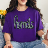Hornets Sequin Patch, sparkling black and silver sequin embroidered patch on a purple t-shirt.