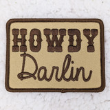 Howdy Darlin Embroidered HAT/POCKET Patch, embroidered patch with the words 'Howdy Darlin' in brown thread on a beige fabric background