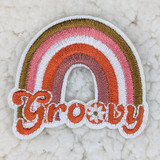 Groovy Rainbow Embroidered HAT/POCKET Patch, colorful rainbow with the word 'Groovy' embroidered in orange and white, decorative patch for clothing or accessories.