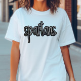 Spartans Sequin Patch, close-up of the sparkling black sequin patch on a white t-shirt.