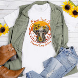 Peaceful Easy Feeling Elephant Eagles Fan Art Sublimation Transfer T-Shirt, featuring a cute elephant with sunflower decorations and glasses, with the text 'Cause I got a Peaceful, Easy Feeling'.