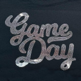 SILVER Game Day Spangled Transfer, a decorative transfer with silver rhinestones spelling 'Game Day' on a black fabric background.