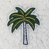 Dark Palm Tree Embroidered HAT/POCKET Patch, green and yellow embroidered palm tree patch with white border on light background.