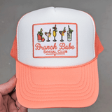 Brunch Babe Embroidered HAT/POCKET Patch, pink and white trucker hat with colorful embroidered cocktail glasses and 'Brunch Babe Social Club' text.