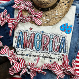 America Dalmation Dots Screen Print Heat Transfer, patriotic American-themed graphic with red, white, and blue colors, stars, and text on a fabric surface.