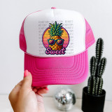 Sweet Pineapple Faux Patch Sublimation Transfer, colorful pineapple wearing sunglasses with the word 'Sweet' below on a pink and white trucker cap.
