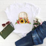 Floral Volleyball Sublimation Transfer, colorful floral design with sunflowers and wildflowers on a volleyball-themed background, printed on a white T-shirt.