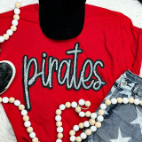 Pirates Sequin Patch, shiny sequin pirate-themed applique on a red T-shirt.