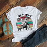 The Original Salty Heifer Sublimation Transfer, graphic t-shirt with a cow wearing a red bandana on colorful striped background.