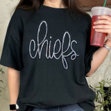 Chiefs Sequin Patch, a decorative patch with the word 'chiefs' in stylish sequins on a black T-shirt.