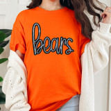 Bears Sequin Patch, orange oversized t-shirt with the word 'bears' decorated with black and silver sequins.