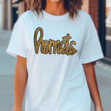 Hornets Gold Sequin Patch, close-up of a white t-shirt with a gold sequin logo of the Hornets team on the chest.