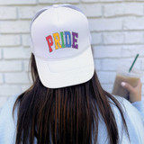 Pride Sublimation Transfer, image of a white trucker hat with colorful Pride design lettering on the front.