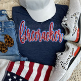 Firecracker Faux Sequin Patch DTF Heat Transfer, colorful red and blue sequin patch on a navy blue sweatshirt.