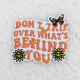 Don't Trip Over What's Behind You Embroidered Hat/Pocket Patch, colorful embroidered patch with motivational quote, butterflies, bees, and sun designs.