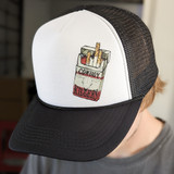 Cowboy Killer Hat/Pocket Screen Print Heat Transfer, trucker-style cap with a white front panel featuring a vintage-style cigarette box graphic with the text 'Cowboy Killers'.