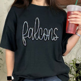 Falcons Sequin Patch, embroidered black t-shirt with sequined 'falcons' text design.