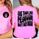 She Took My Problem Not My Man BLACK SET DTF Heat Transfer, pink T-shirt with black bold text on the back and a black circle with peace hand sign on the front.
