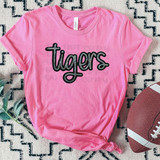 Tigers Faux Sequin Patch DTF Heat Transfer, pink t-shirt with black sequin tiger logo text and a football ball beside it on the carpet.