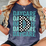 Daycare Checker DTF Heat Transfer, printed on a dark gray T-shirt featuring a large checkered letter 'D' in the center with the word 'DAYCARE' repeated in the background in teal color.