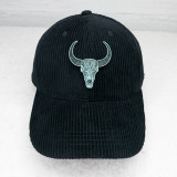 Tribal Bull Skull FAUX Leather Patch, black corduroy baseball cap with an embroidered bull skull patch on the front.