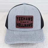 Yeehaws and Hellnaws FAUX Leather Patch - A gray and black trucker cap with a rectangular faux leather patch featuring the brand name and slogan.