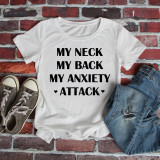 My Neck My Back My Anxiety Attack Sublimation Transfer T-shirt, casual white T-shirt with bold black text on a brick wall background, paired with distressed jeans and sneakers.