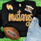 Mustangs Gold Sequin Patch, a gold sequined patch with the word 'mustangs' in cursive and a cross, displayed with clothing and accessories.