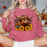 Sunflower Cow DTF Heat Transfer, colorful floral and cow illustration on a pink sweatshirt.